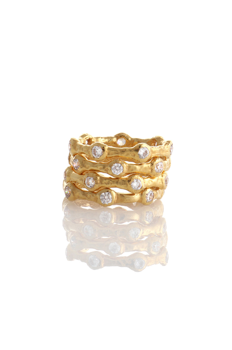 SET OF FOUR WAVE RINGS WITH STONES