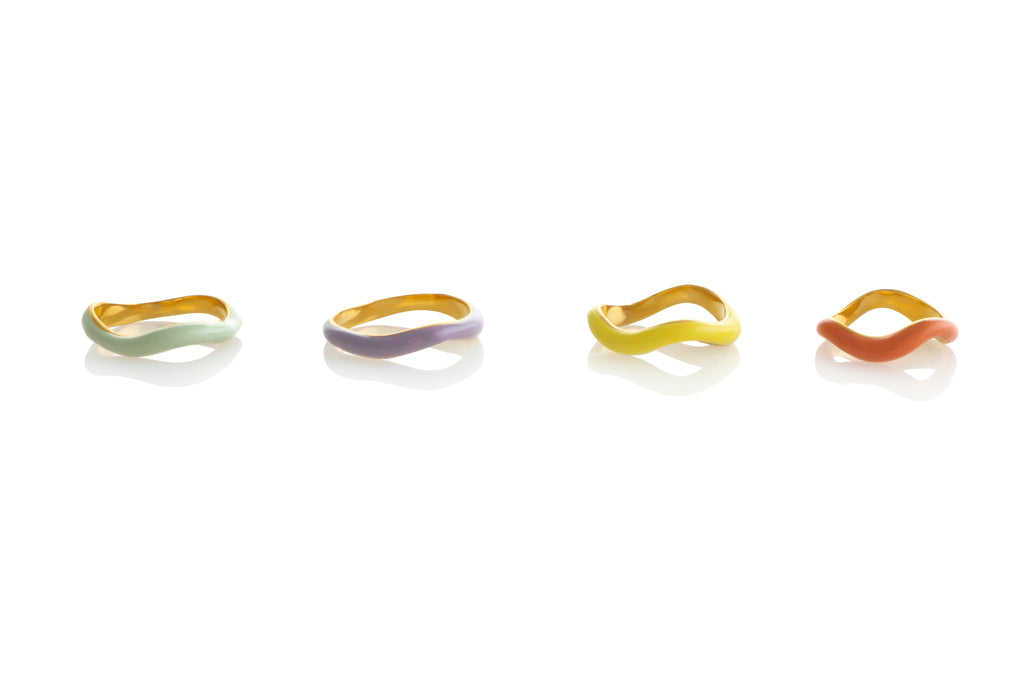 SET OF FOUR WAVE RINGS WITH MULTI COLORED ENAMEL